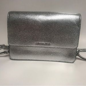 MK metallic silver purse